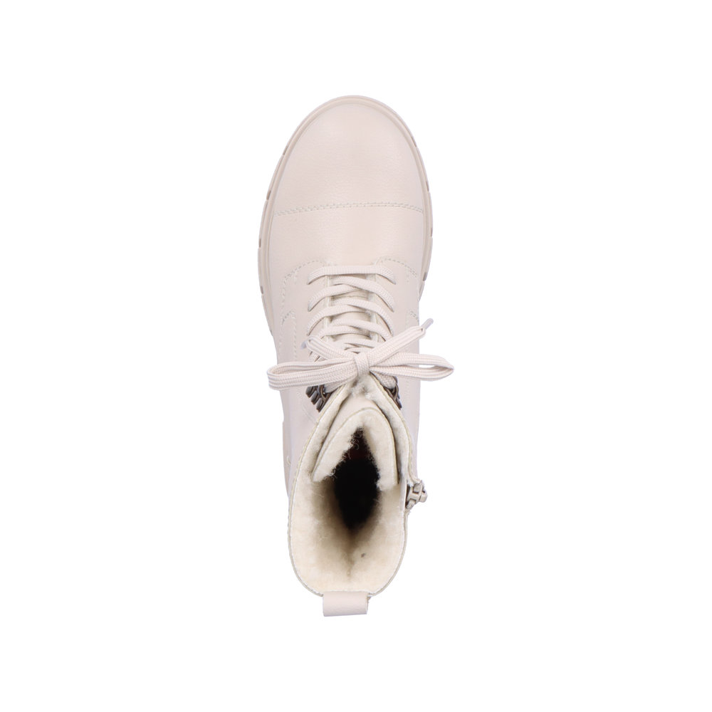 фото Утепленные ботинки молочного цвета из натуральной кожи на утолщенной подошве rieker