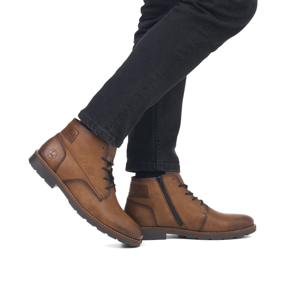 фото Коричневые утепленные ботинки из кожи и экокожи rieker