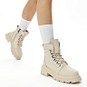Светло-бежевые ботинки на шнуровке из кожи на подкладке из натуральной шерсти на тракторной подошве
