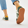 Зеленые кроссовки из кожи и текстиля