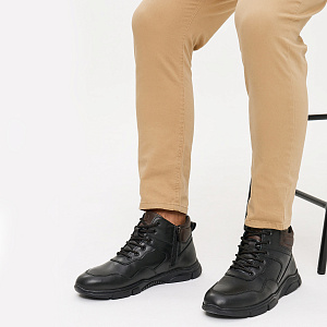 Черные кроссовки из кожи с декоративной отстрочкой на подкладке из натуральной шерсти